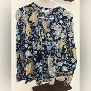 Long sleeve women’s boutique top. Blue and yellow floral print. NWT.